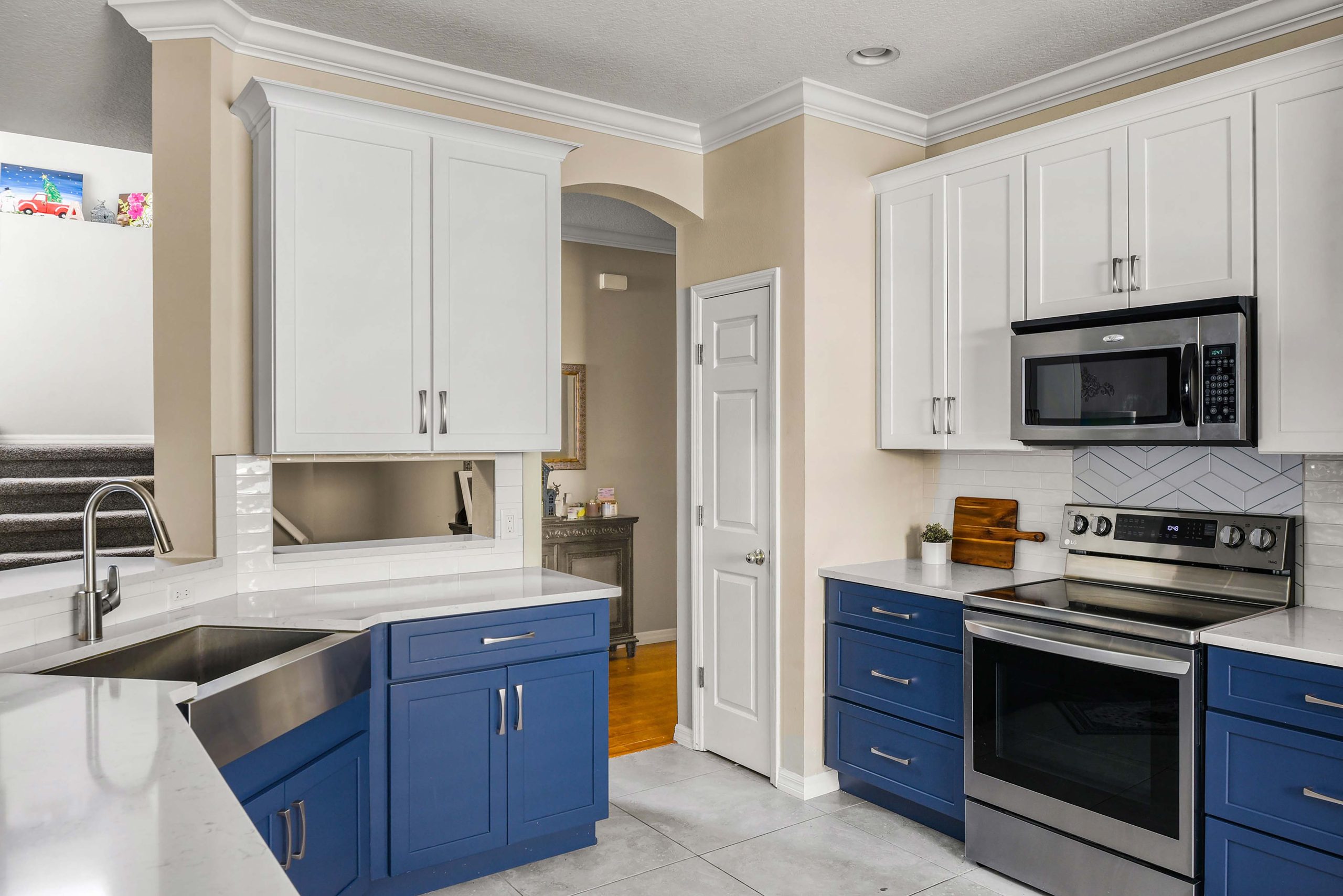blue and white two tone kitchen remodel in tampa, fl 