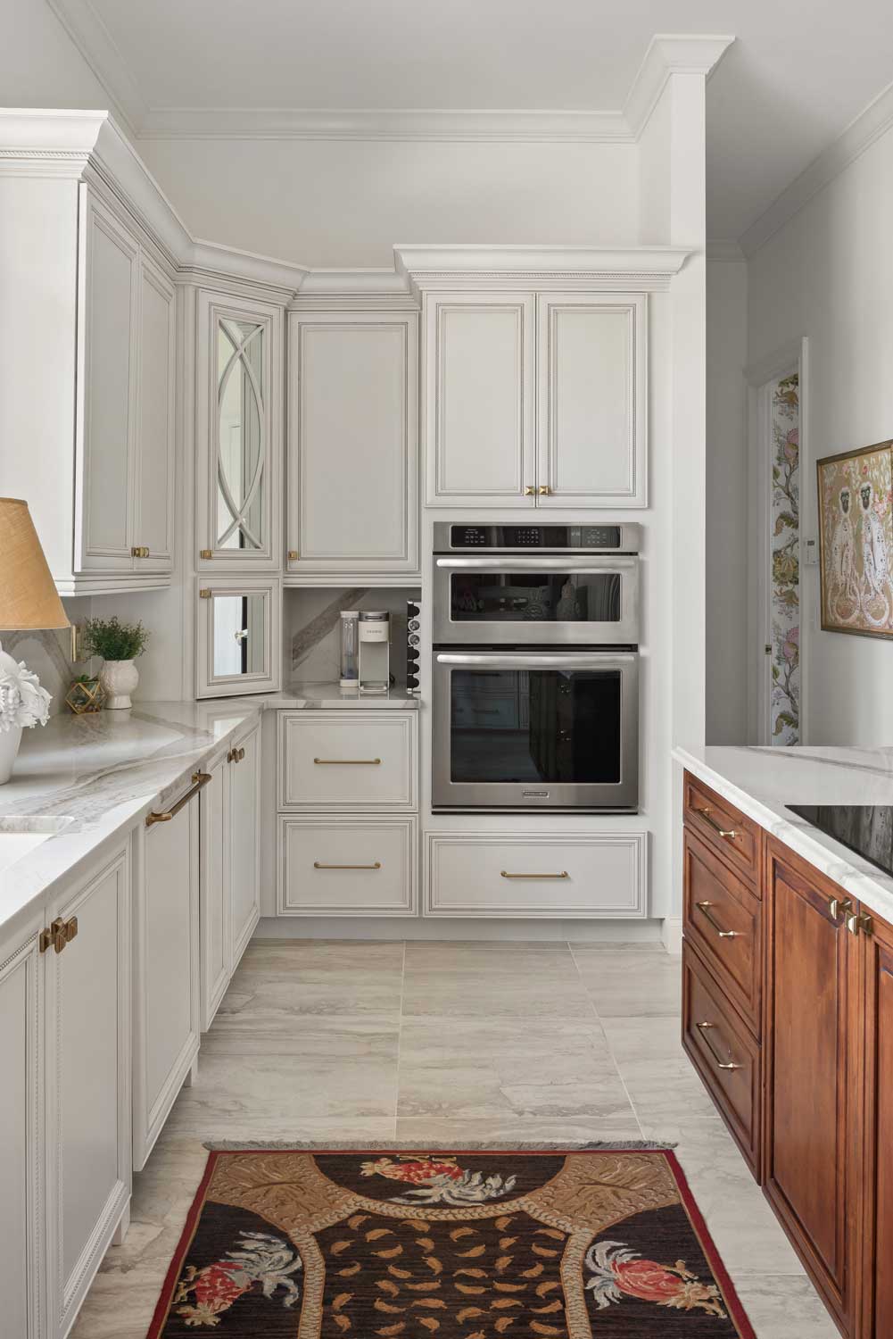 kitchen remodel in seminole county fl featuring white custom cabinets and hidden appliances