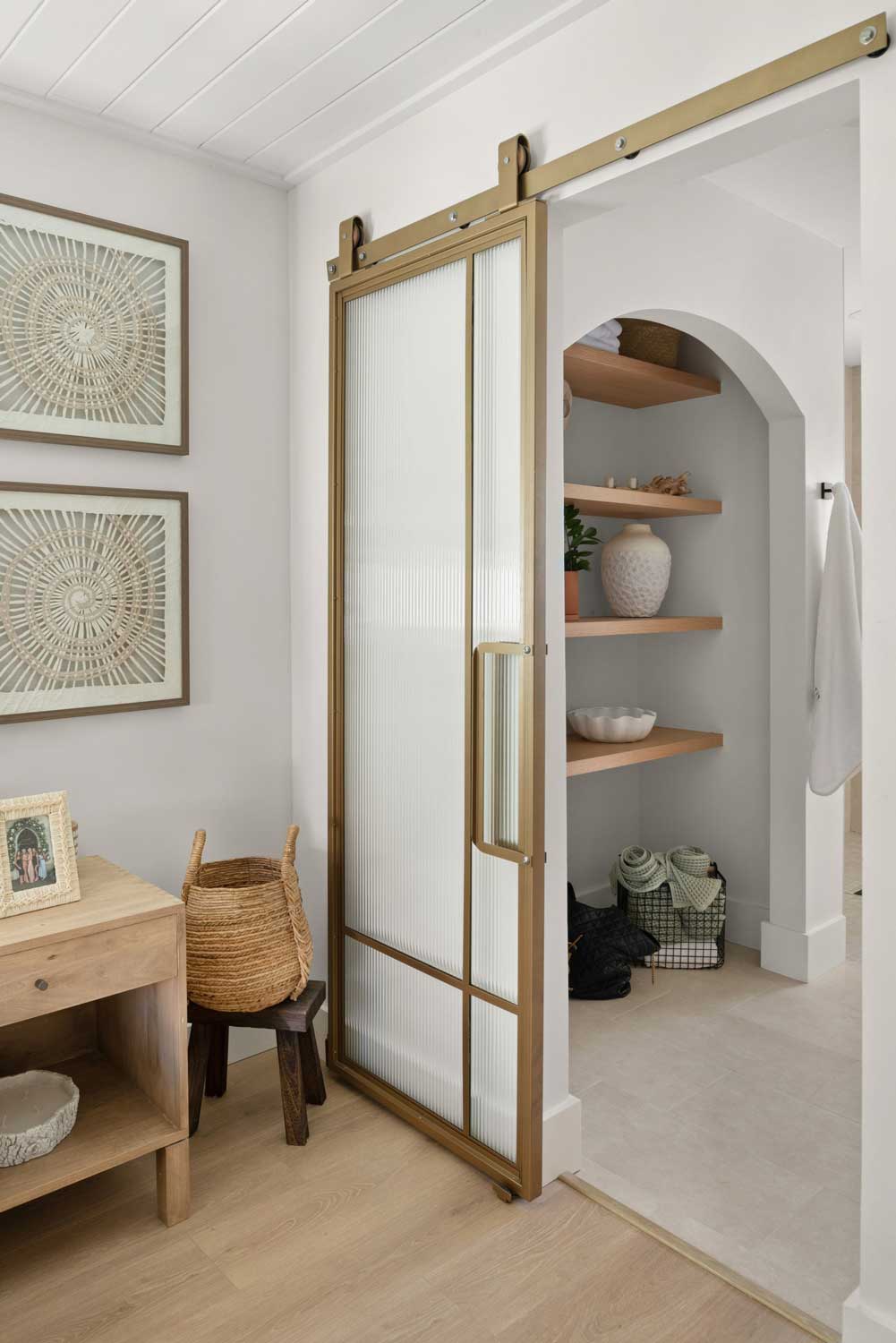 organic modern bathroom with barn door  in tampa