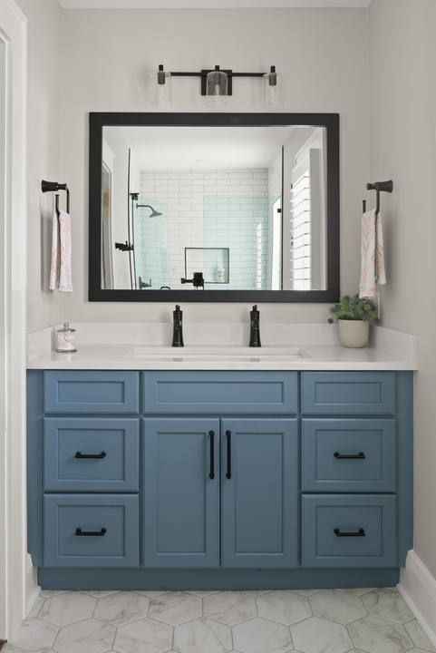 guest bathroom with a pop of blue