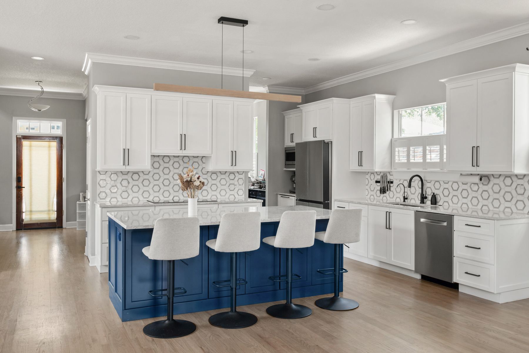 Modern kitchen with blue island in Tampa, Fl