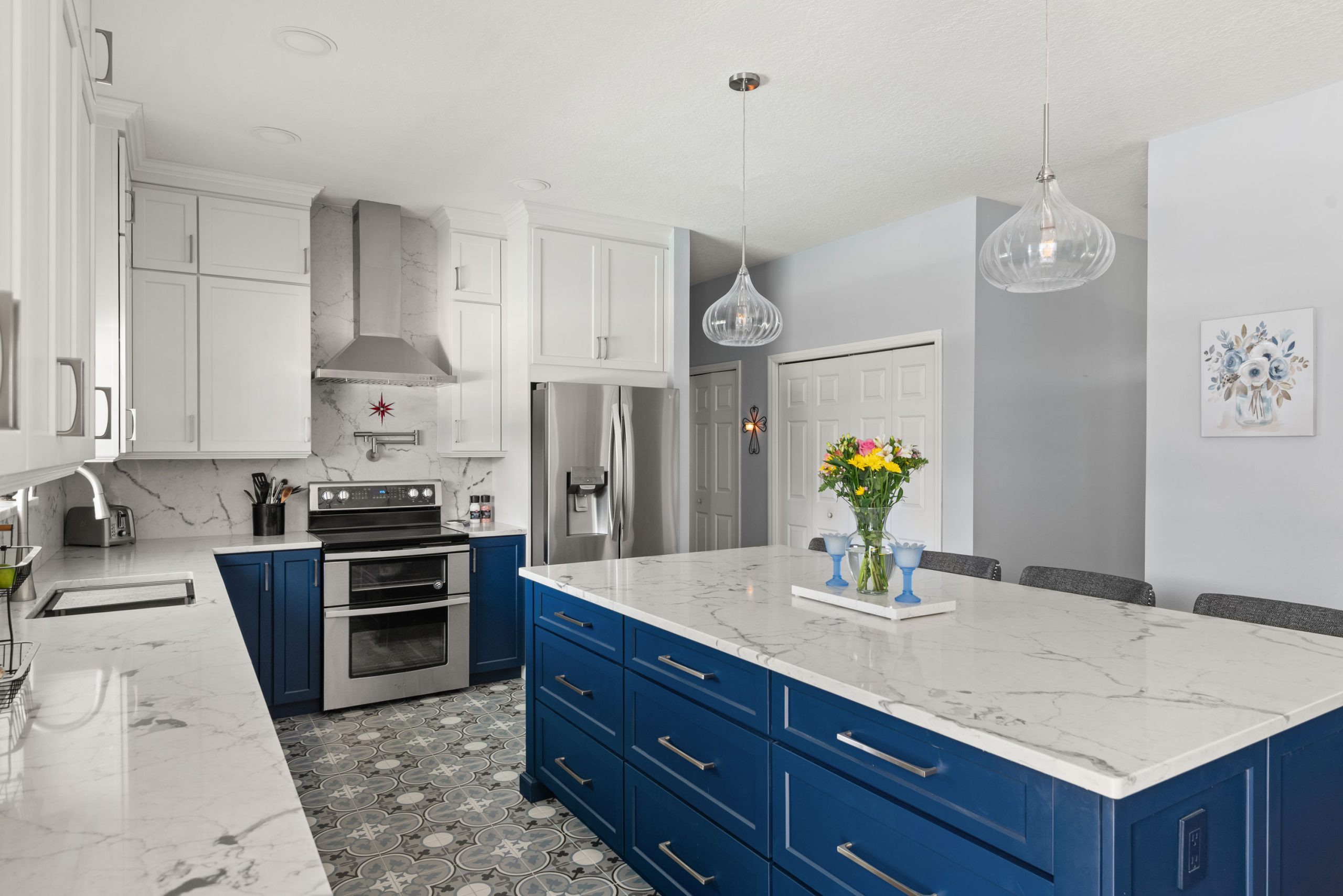 Crestwood Drive S&W Kitchens remodel project view of island, fridge and range