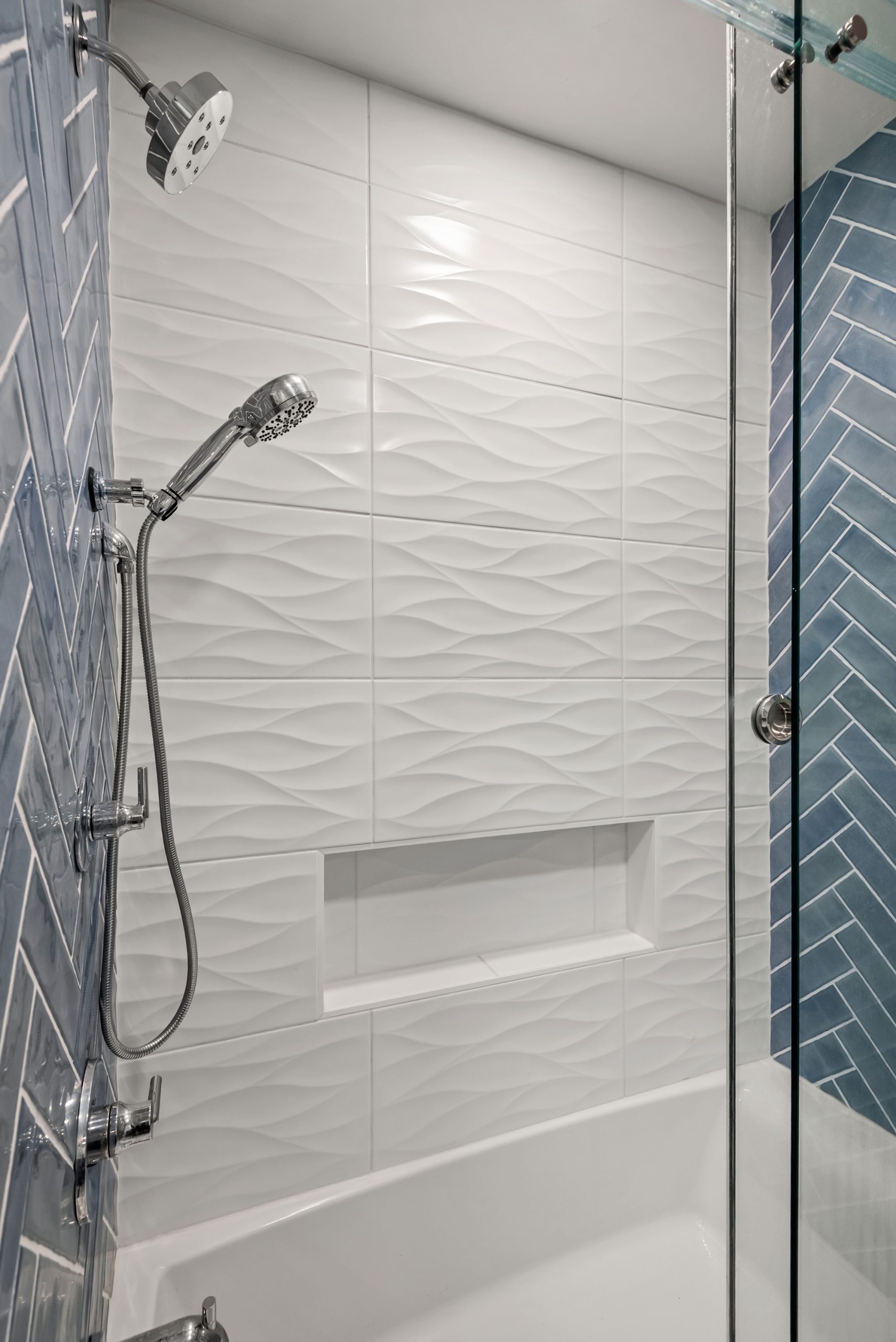 Gulf Way Tampa bath remodel white tile wall in shower with niche.