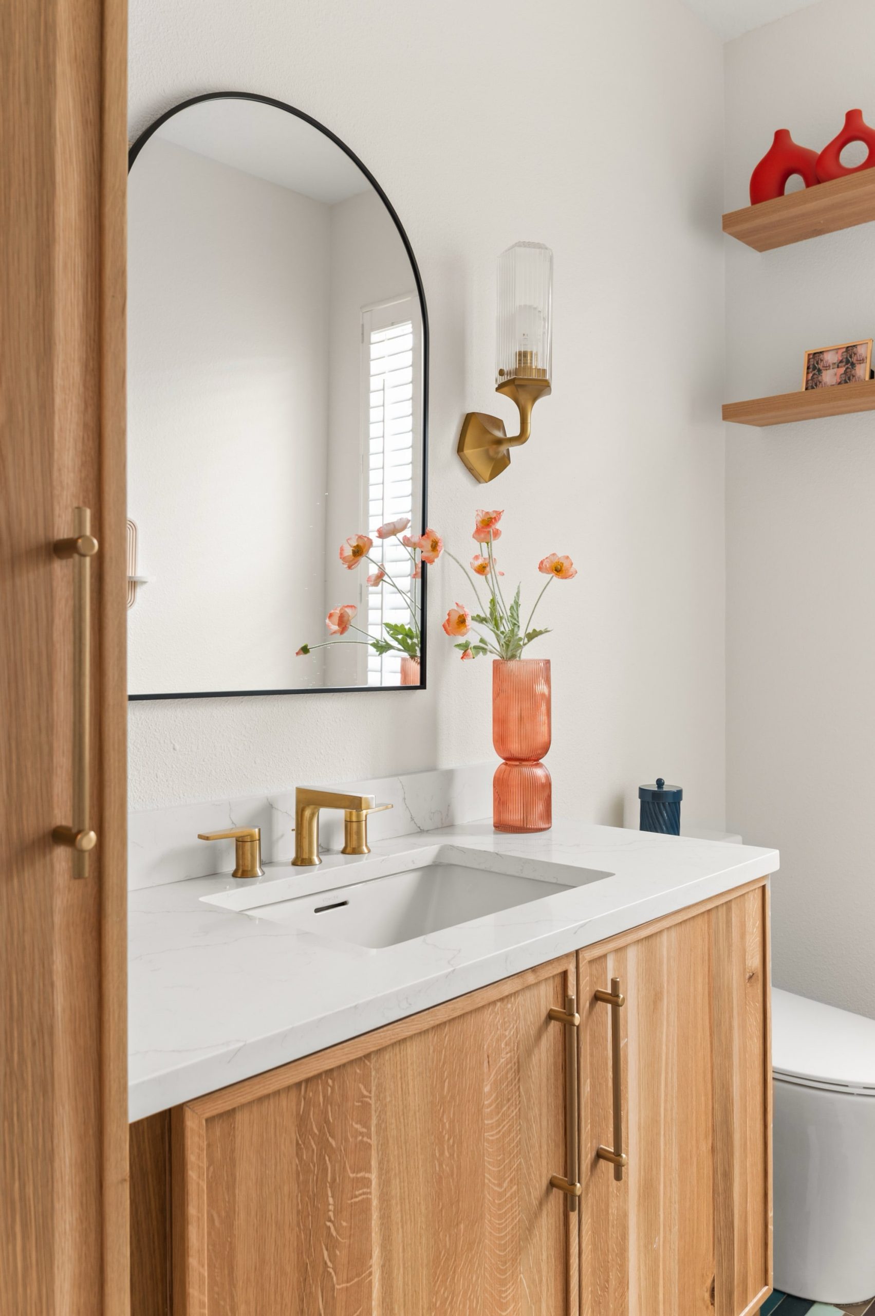 Windermere, FL powder room remodel warm wood cabinetry
