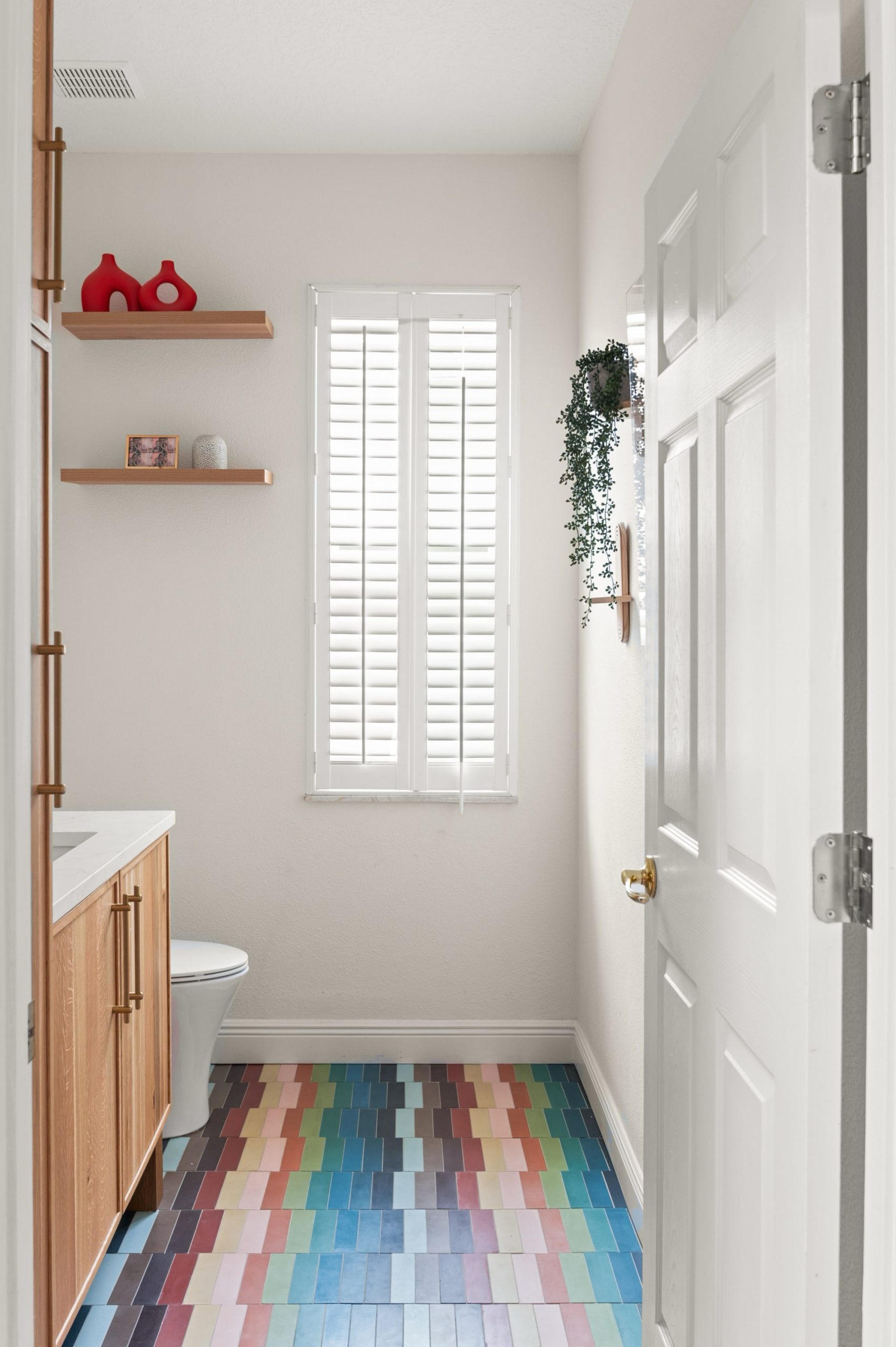 Amelia Pond Drive bathroom remodel colorful geometric floor tile 