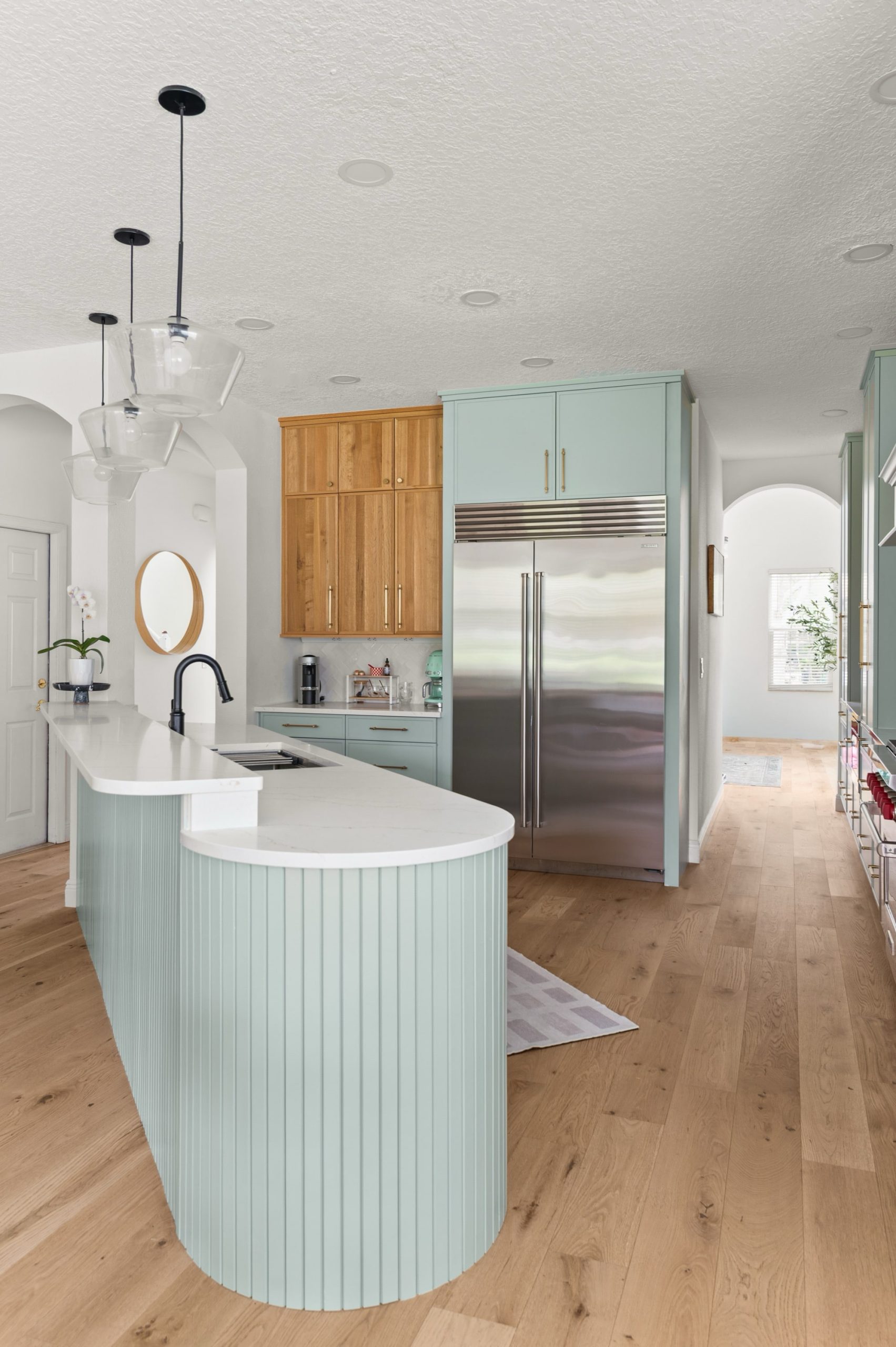 Amelia Pond Drive large island with generous countertop space provides a functional centerpiece for meal prep